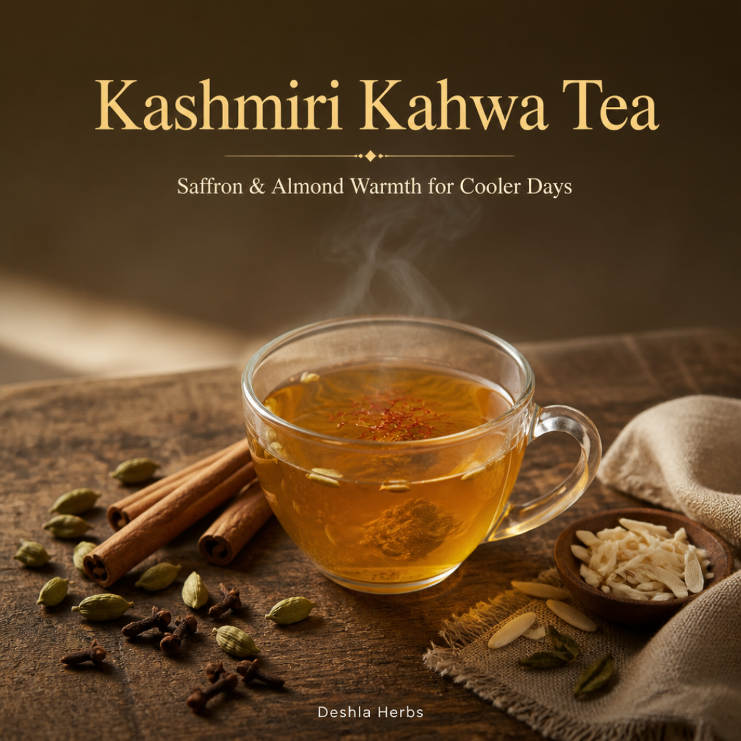 A warm golden cup of Kashmiri Kahwa Tea with saffron strands and almonds, surrounded by warming spices, styled for a cozy seasonal tea ritual by Deshla Herbs.