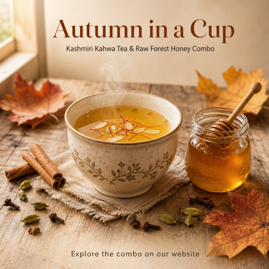 A warm cup of Kashmiri Kahwa tea with saffron strands and almonds, beside a jar of raw forest honey, styled for a cozy mid-October autumn setting.