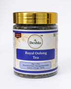 Jar of Deshla Royal Oolong Tea with gold lid on a white background