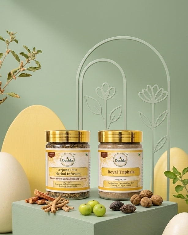 Two jars of herbal products on a decorative stand with greenery and eggs in the background.