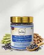Deshla Blue Butterfly Pea Herbal Infusion jar with lemongrass, licorice, and a wooden spoon on a white background